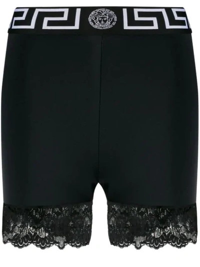 Shop Versace Lace-trimmed Short Leggings In Black