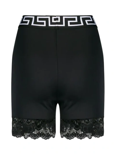 Shop Versace Lace-trimmed Short Leggings In Black