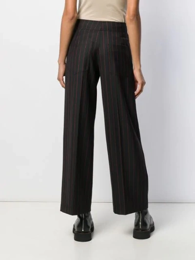 Shop Mcq By Alexander Mcqueen Pinstriped High-waisted Trousers In Black