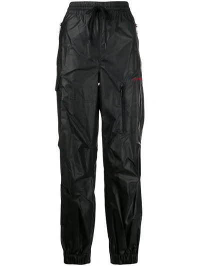 Shop Alexander Wang Leather-look Track Pants In Black