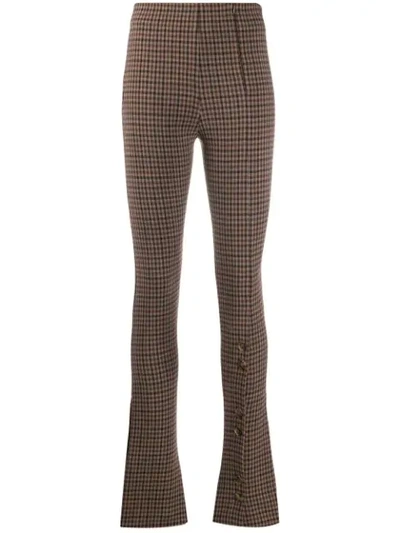 Shop A.w.a.k.e. Flared Check Trousers In Beige/brown
