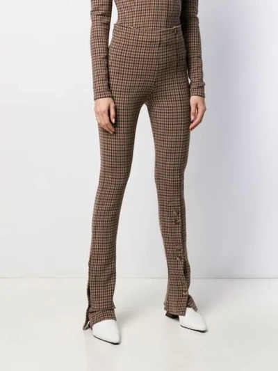 FLARED CHECK TROUSERS