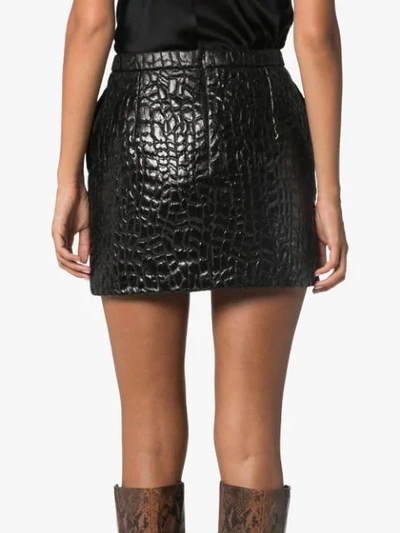 Shop Saint Laurent Crocodile-effect Mini Skirt In Black