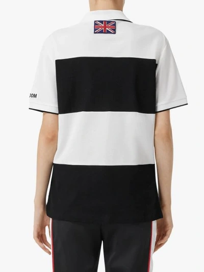 Shop Burberry Logo Appliqué Striped Oversized Polo Shirt In White