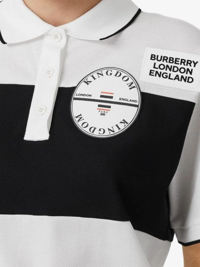 Shop Burberry Logo Appliqué Striped Oversized Polo Shirt In White