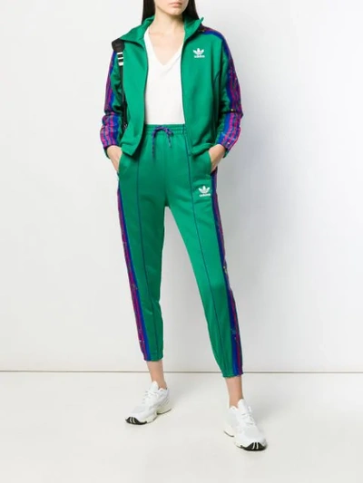 Shop Adidas Originals Signature Stripe Track Pants In Green