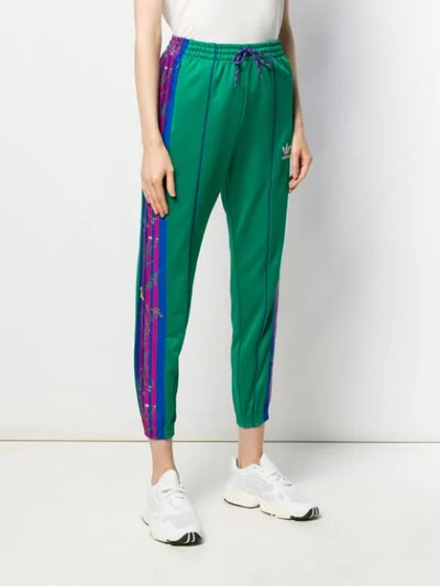 Shop Adidas Originals Signature Stripe Track Pants In Green