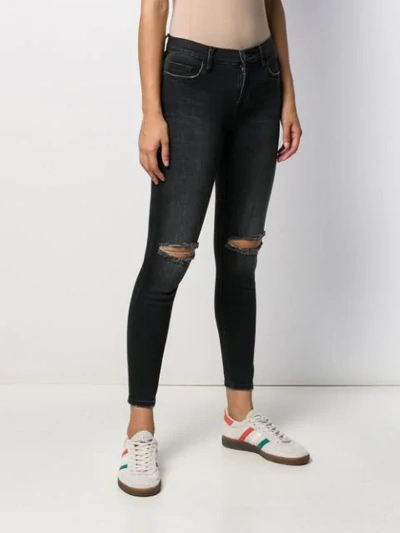 Shop Current Elliott Mid-rise Skinny Distressed Jeans In Black