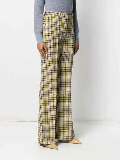 Shop Victoria Beckham Houndstooth Flared Trousers In Neutrals