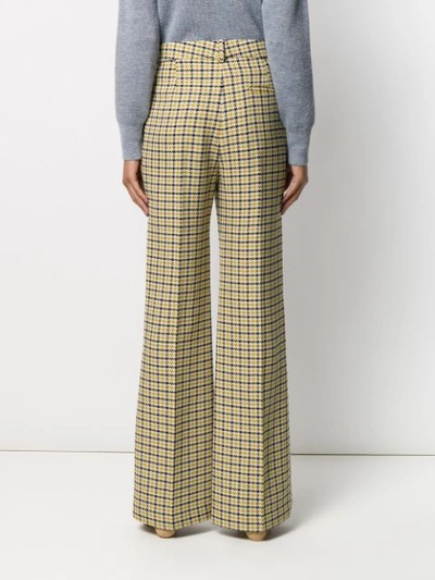 Shop Victoria Beckham Houndstooth Flared Trousers In Neutrals