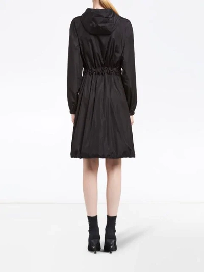 Shop Prada Belted Hooded Raincoat In Black