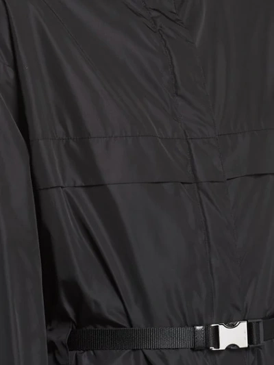 Shop Prada Belted Hooded Raincoat In Black
