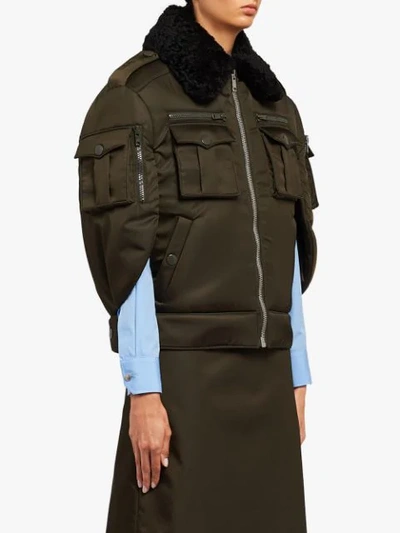 Shop Prada Cape Sleeves Bomber Jacket In Green