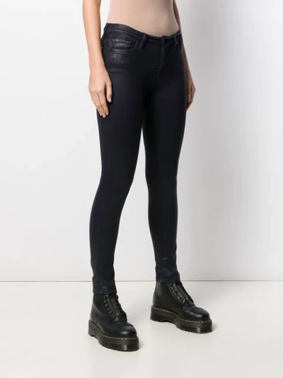 Shop 7 For All Mankind Coated Skinny Jeans In Blue