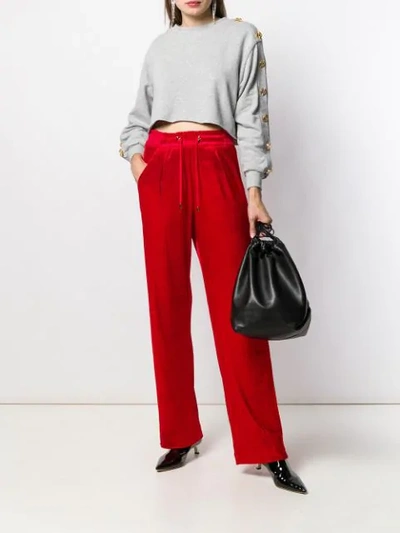 Shop Balmain Wide Leg Jogging Style Trousers In Red