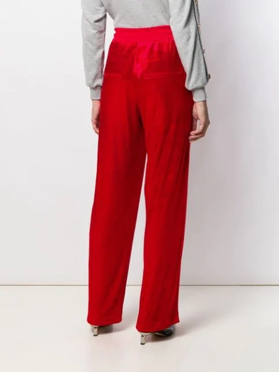 Shop Balmain Wide Leg Jogging Style Trousers In Red
