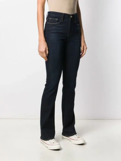 Shop Frame Mini Boot Mid-rise Bootcut Jeans In Blue