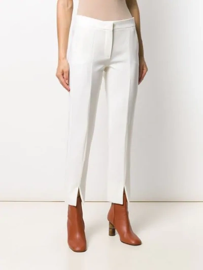 Shop Max Mara Slit Tapered Trousers In Neutrals