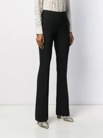 Shop Chloé High-rise Flared Trousers In 001 Black