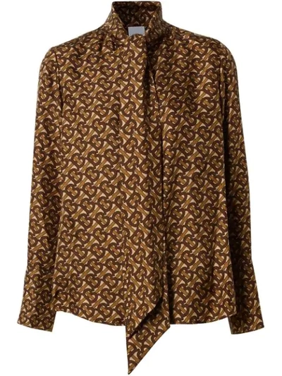 Shop Burberry Monogram Pussy-bow Shirt In Brown