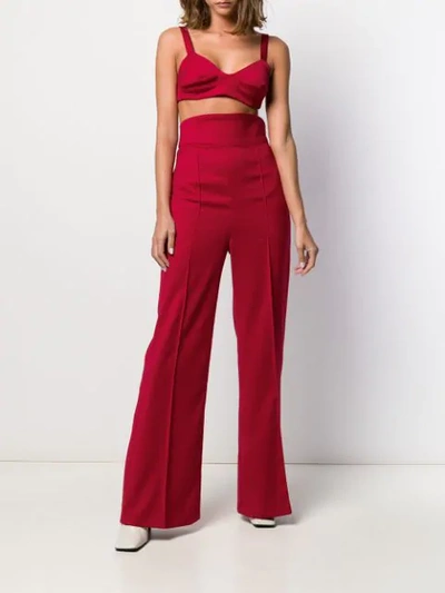 Shop Atu Body Couture High Waisted Flared Trousers In Red