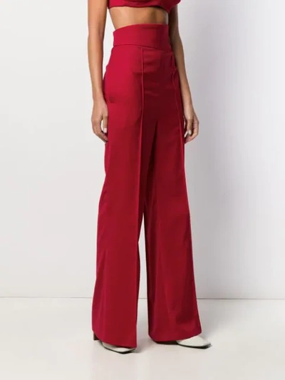 Shop Atu Body Couture High Waisted Flared Trousers In Red