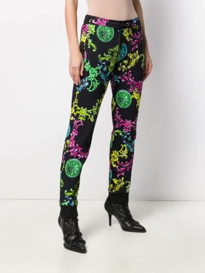 Shop Versace Jeans Couture Ornate Print Track Trousers In Black