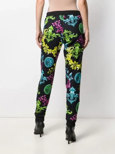 Shop Versace Jeans Couture Ornate Print Track Trousers In Black