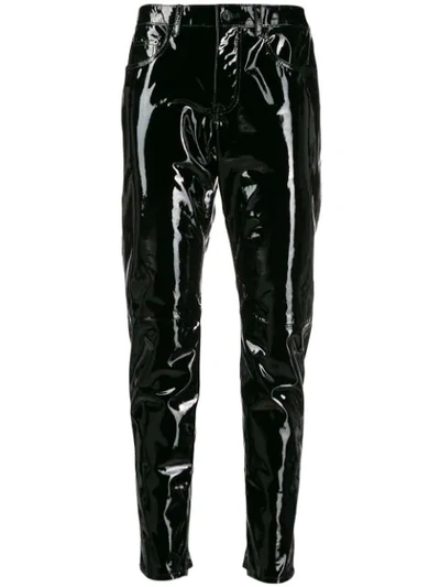 Shop Saint Laurent Patent Tapered Trousers In Black