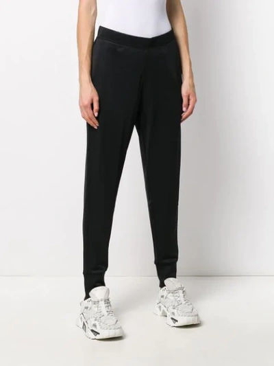 Shop Calvin Klein Tapered Track Trousers In Black