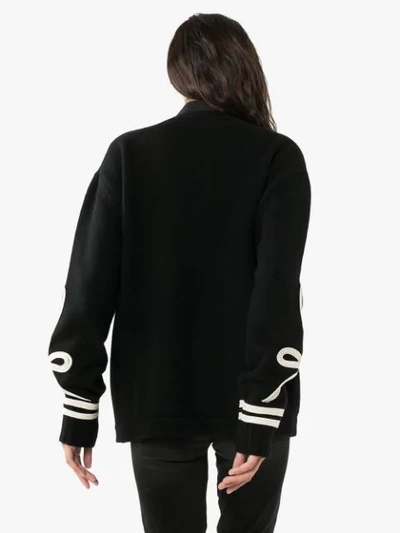 Shop Amiri Appliqued Wool And Cashmere-blend Cardigan In Black
