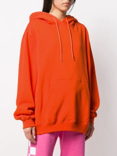 Shop Msgm Logo Print Hoodie In Orange