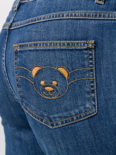 Shop Moschino Teddy Bear Embroidered Skinny Jeans In Blue