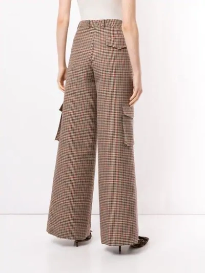 Shop Bouguessa Check Print Cargo Trousers In Brown