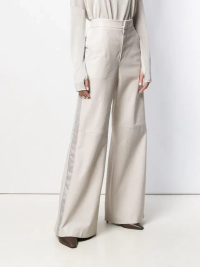 Shop Brunello Cucinelli Flared High Waisted Trousers In Grey