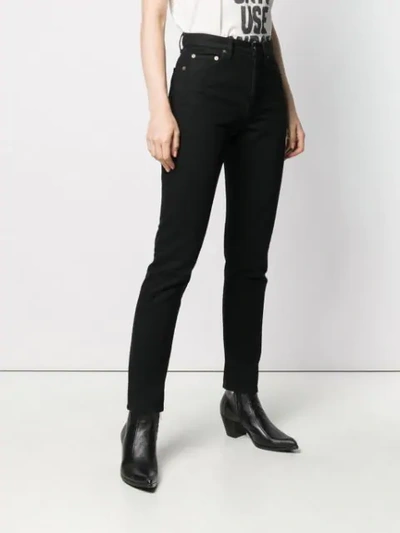 Shop Saint Laurent High-rise Slim-fit Jeans In Black
