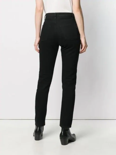 Shop Saint Laurent High-rise Slim-fit Jeans In Black