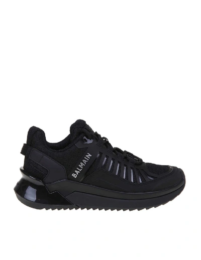 Shop Balmain B-trail Sneakers In Leather And Black Fabric