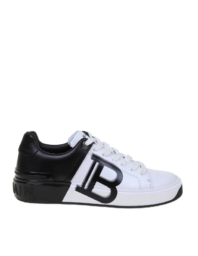 Shop Balmain B-court Sneakers In Leather White / Black