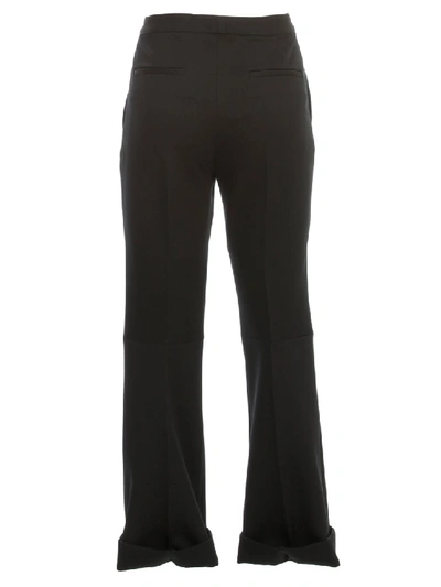 Shop Maison Margiela Flared Trousers In Black