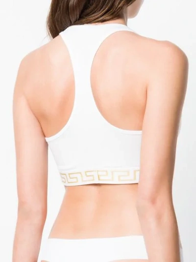 Shop Versace Logo Elastic Trim Sports Bra In White