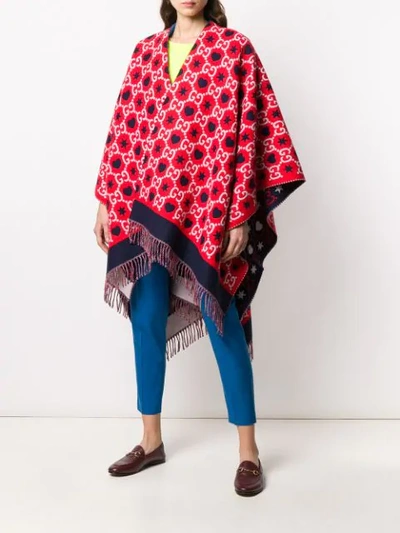 Shop Gucci Reversible Gg Fringed Poncho In Red