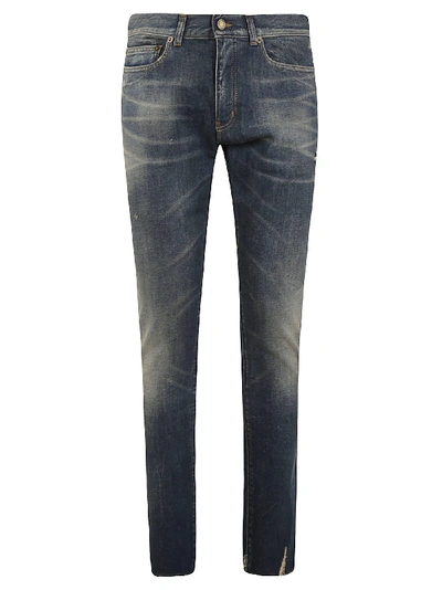Shop Saint Laurent Faded Detail Jeans In Blue Moon