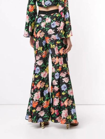 Shop Alice Mccall Floral Picasso Flared Trousers In Black