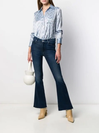 Shop Mother Low Rise Kick Flared Jeans In Blue
