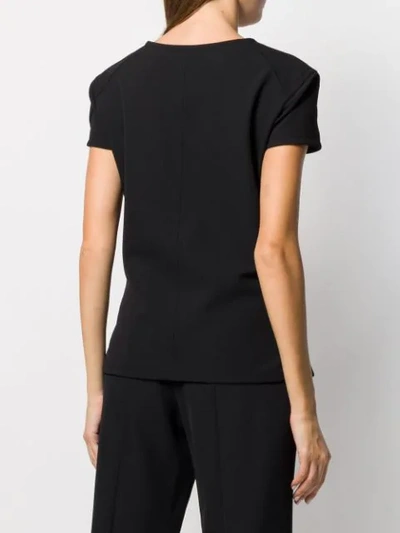 Shop Courrèges Plain Fitted T-shirt In Black