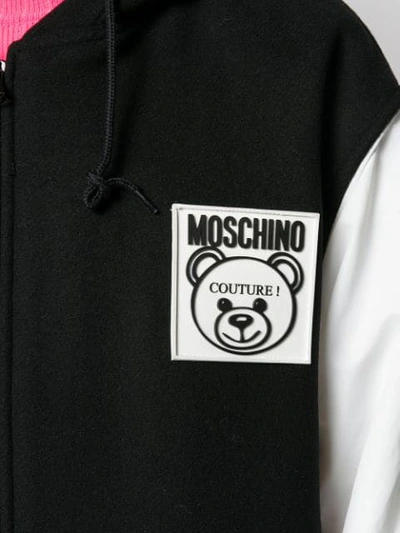 Shop Moschino Oversized Zip Up Coat In Black