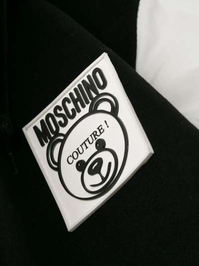 Shop Moschino Oversized Zip Up Coat In Black