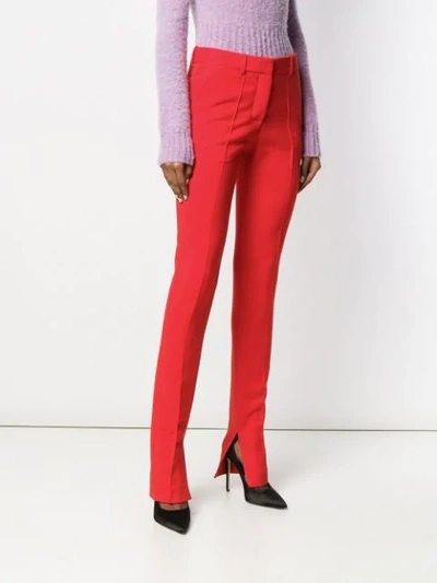 Shop Victoria Beckham Ankle Split Trousers In Red