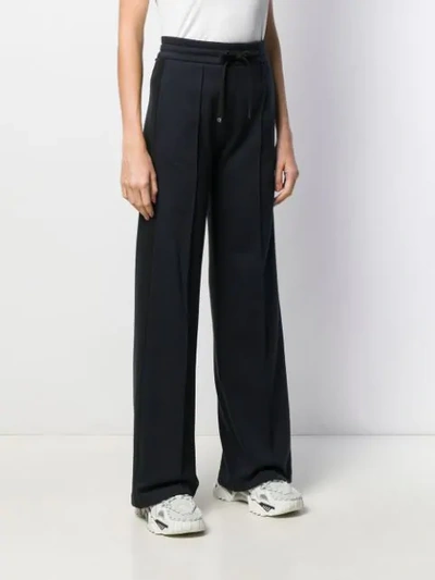 Shop Moncler High-waisted Track Pants In Blue